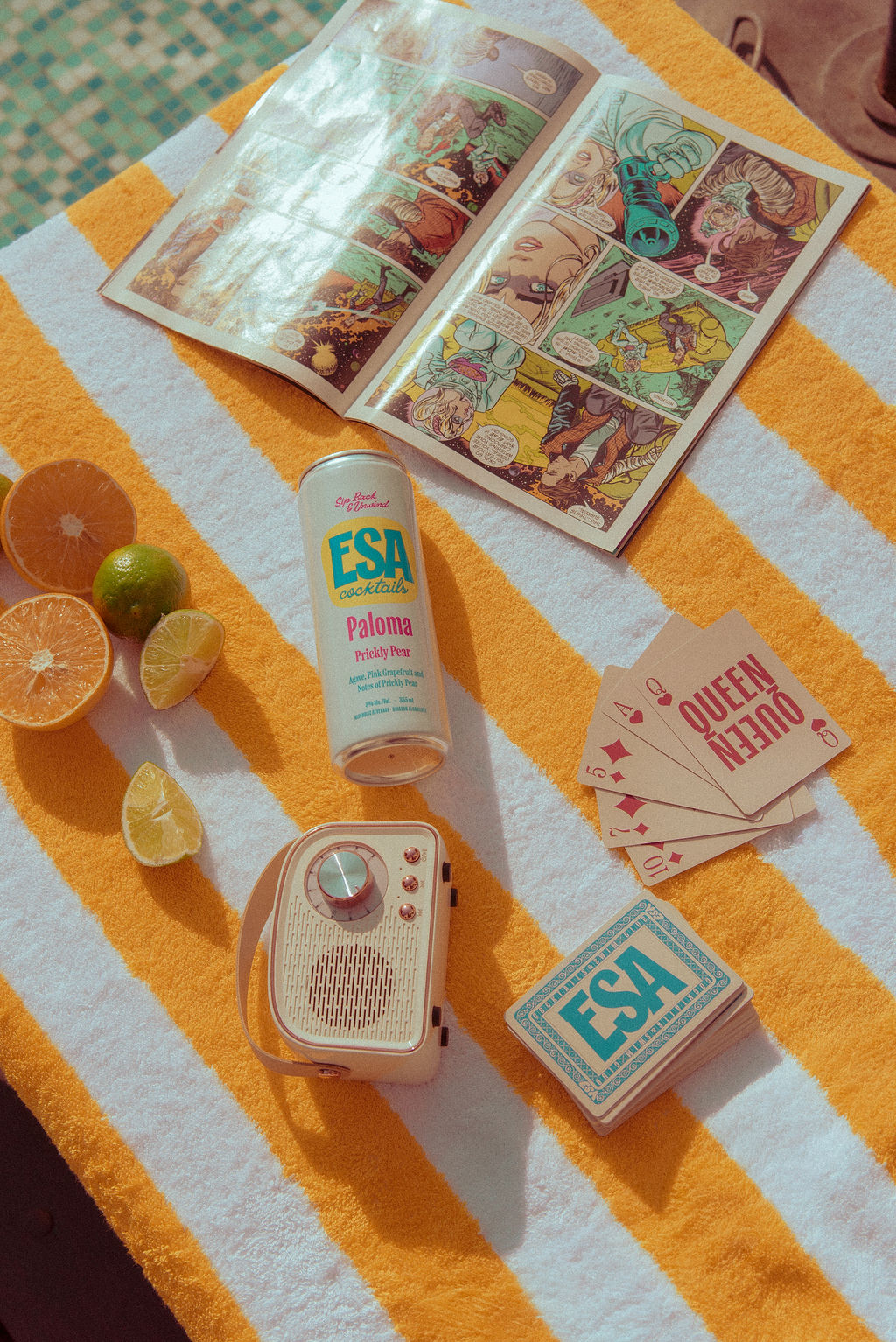 ESA Paloma flat lay with citrus and cards
